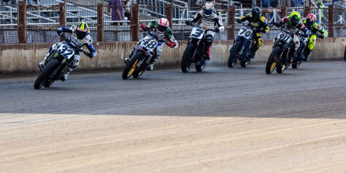 Dallas Daniels (32), Trent Lowe (48), Briar Bauman (3), Declan Bender (70), Henry Wiles (911), and Brandon Price (92) race down the front straightaway during the Mission AFT SuperTwins Main Event in Springfield during the Springfield Mile II event. Photo by Tim Lester / courtesy American Flat Track.