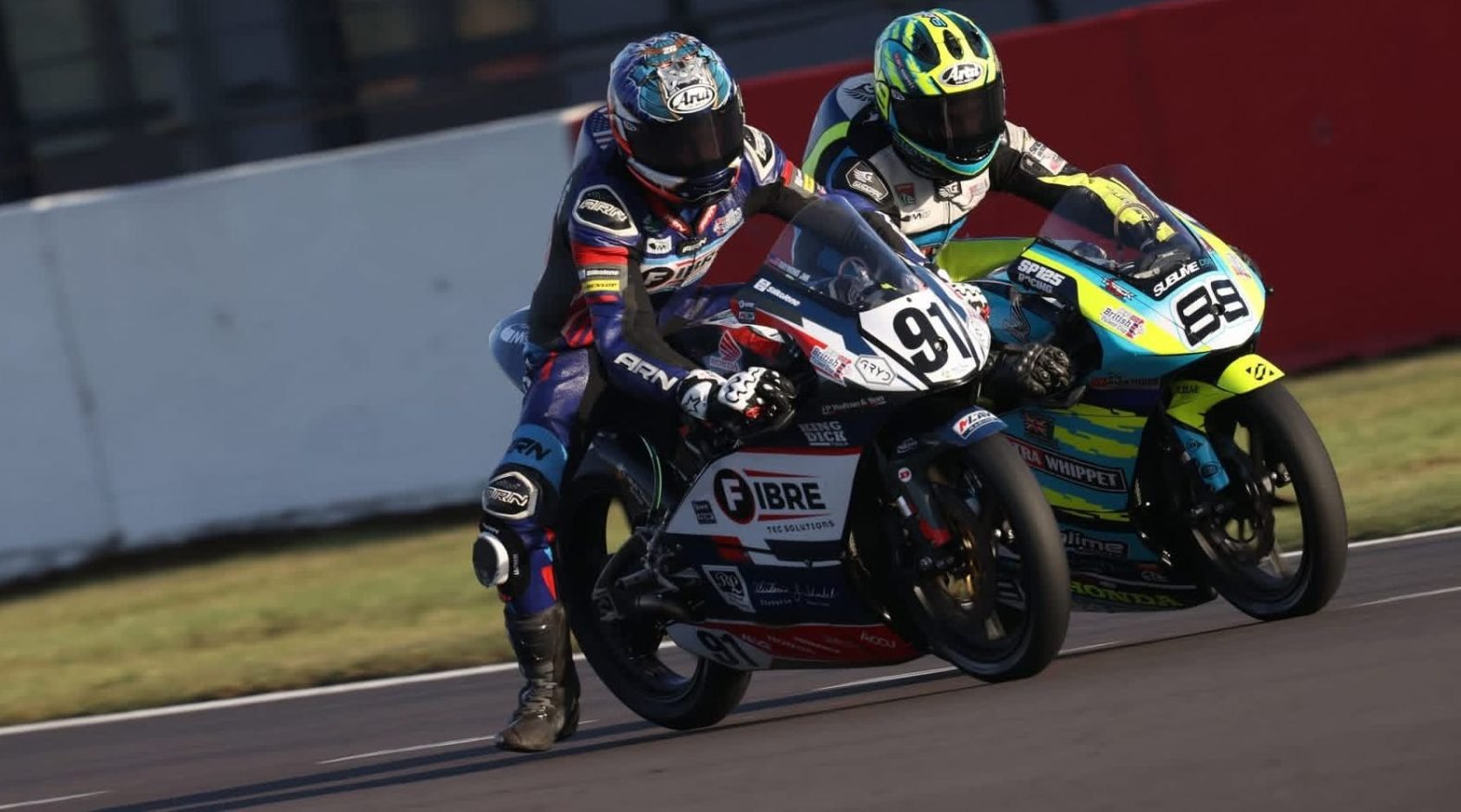 Josh Raymond Jr (91) makes an aggressive pass on Mason Foster (88). Photo courtesy R+G British talent cup.