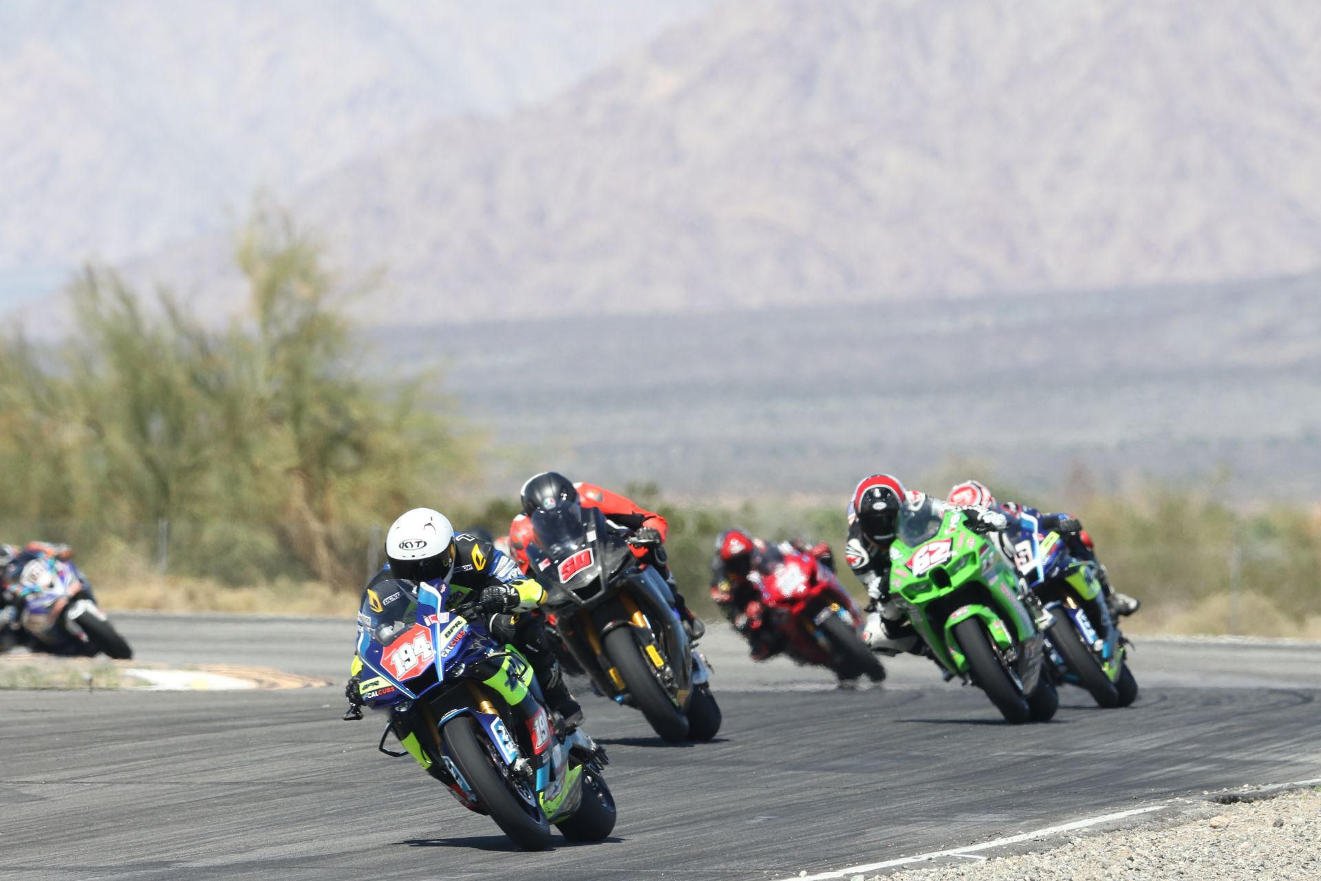 Deion Campbell (194) leading Nicholas Ciling (50), Andy DiBrino (62) and Michael Gilbert (55) at the start of The Shootout. Photo Credit Caliphotography.