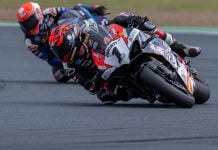 Waters (1) and Jones in close SW-Motech Superbike combat at Queensland Raceway. Photo by RbMotoLens