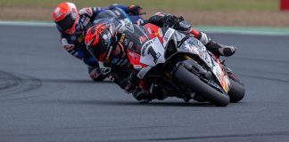 Waters (1) and Jones in close SW-Motech Superbike combat at Queensland Raceway. Photo by RbMotoLens